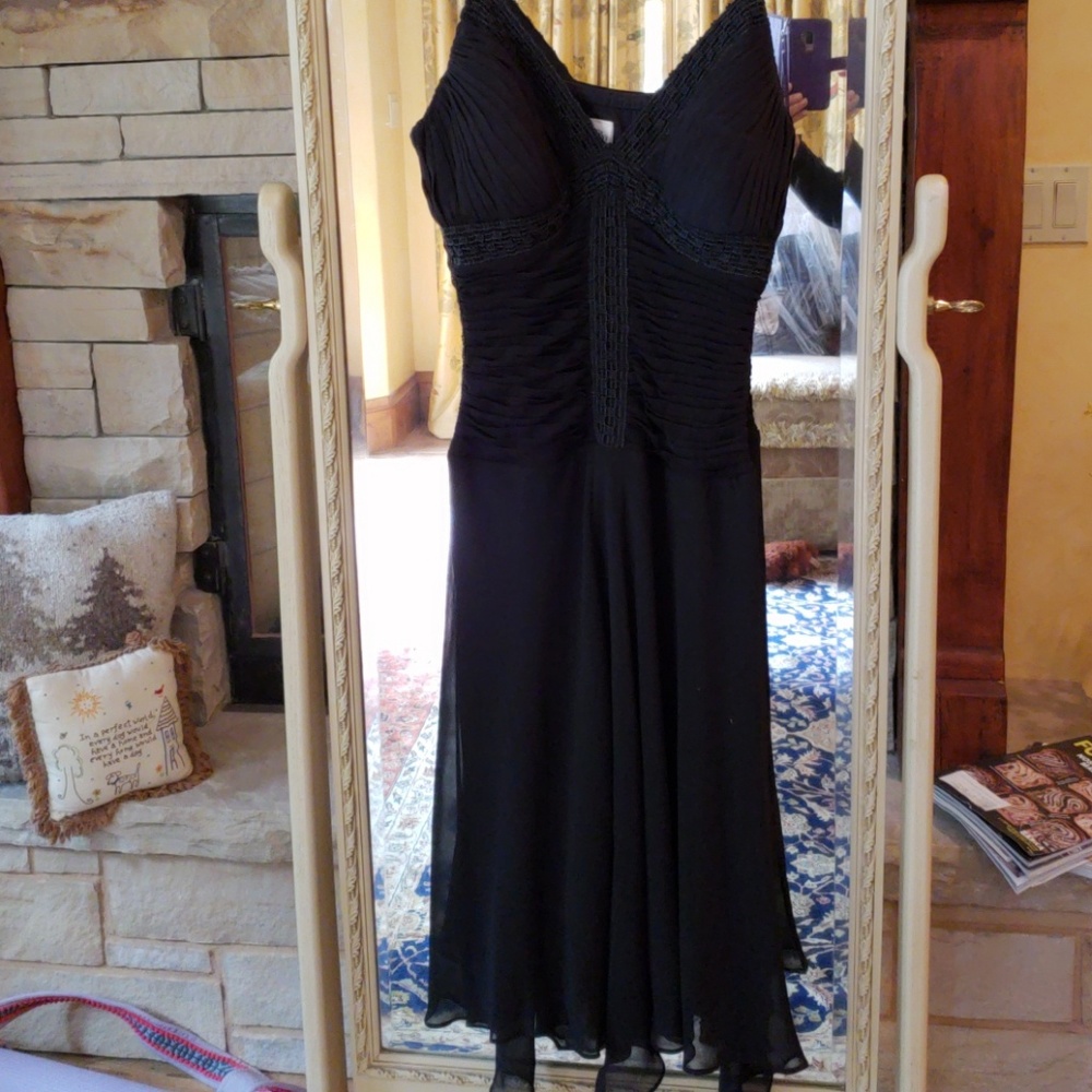 Sangria black cocktail dress.